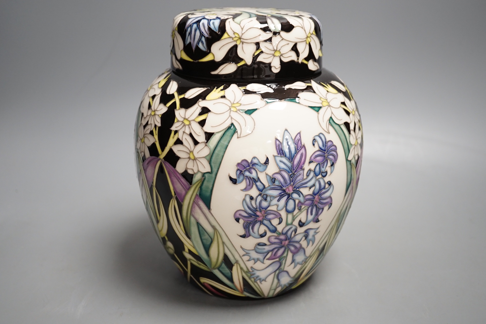 A Moorcroft trial 16.3.18 'hyacinth' jar and cover, boxed, (possibly limited edition of 15), 20cms high.